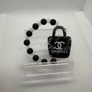 Black and White Beaded Bracelet with Logo Charm